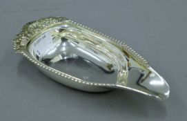 A George III silver pap boat with scallop shell, grape and beaded border by Samuel Wintle,