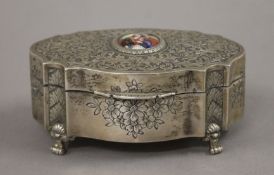 An 800 silver porcelain mounted box. 12.5 cm wide. 290 grammes total weight.