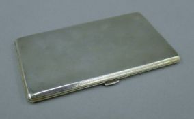 A silver cigarette case. 14 cm high. 214.1 grammes.