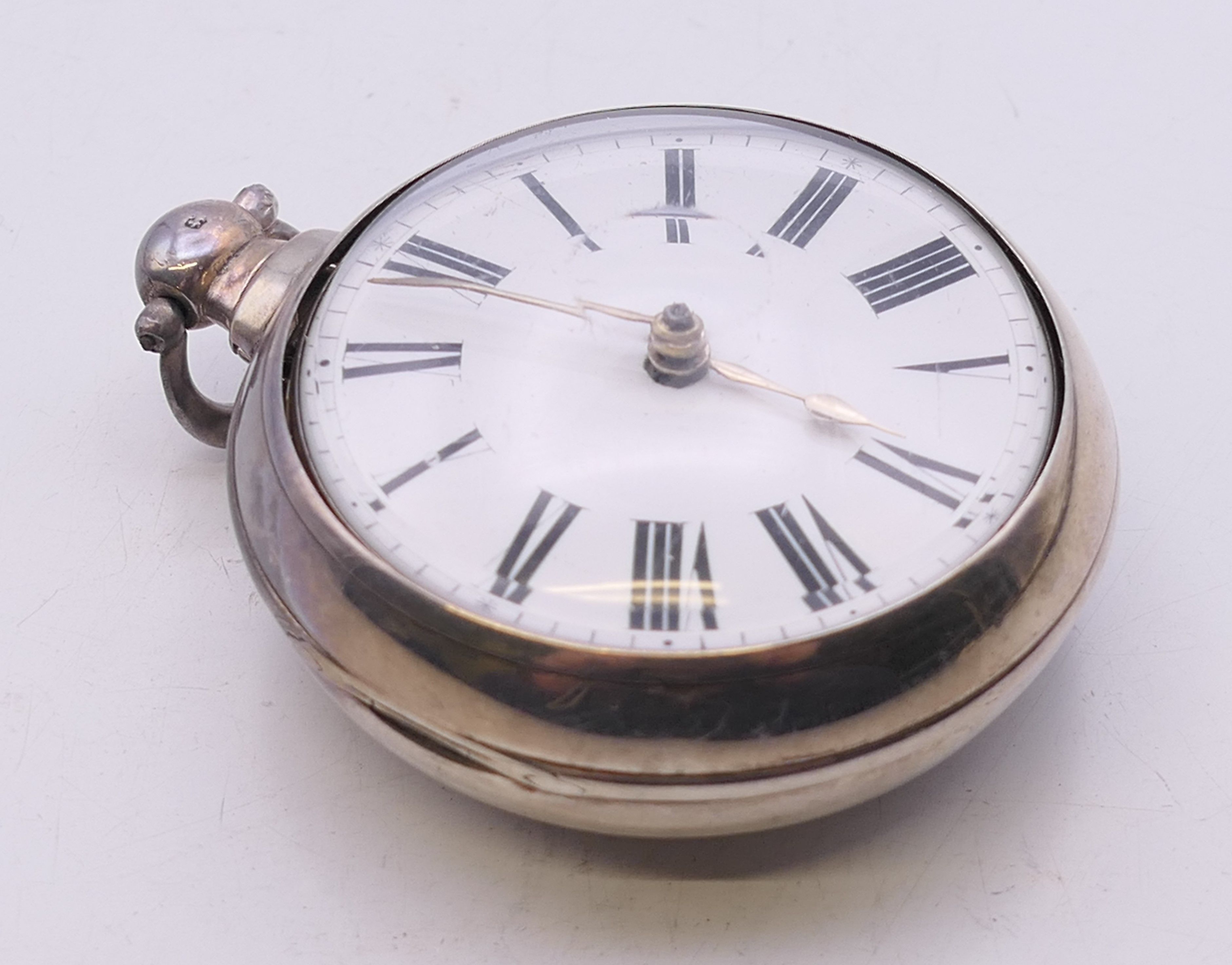 A silver pair cased pocket watch. 5.5 cm diameter. - Image 2 of 8