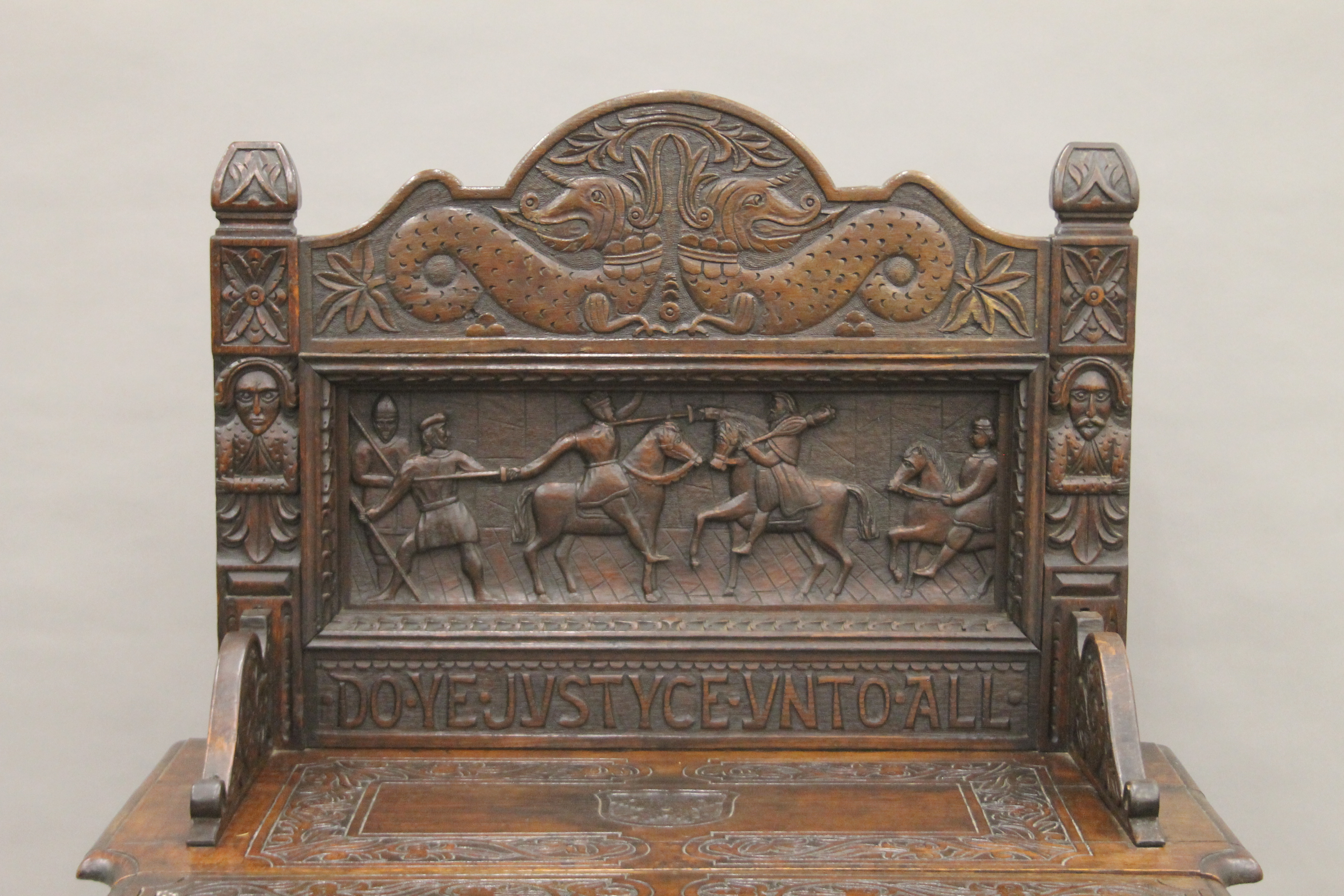 A carved oak single flap side table, the back carved with a scene titled Do Ye Justyce Unto All. - Image 4 of 8