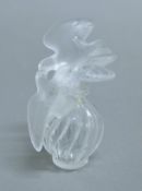 A Lalique glass scent bottle. 10.5 cms high.