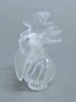 A Lalique glass scent bottle. 10.5 cms high.
