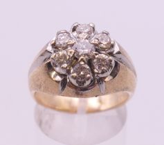 A 14 k gentleman's seven stone diamond ring. 11.5 grammes total weight. Ring size Q/R.