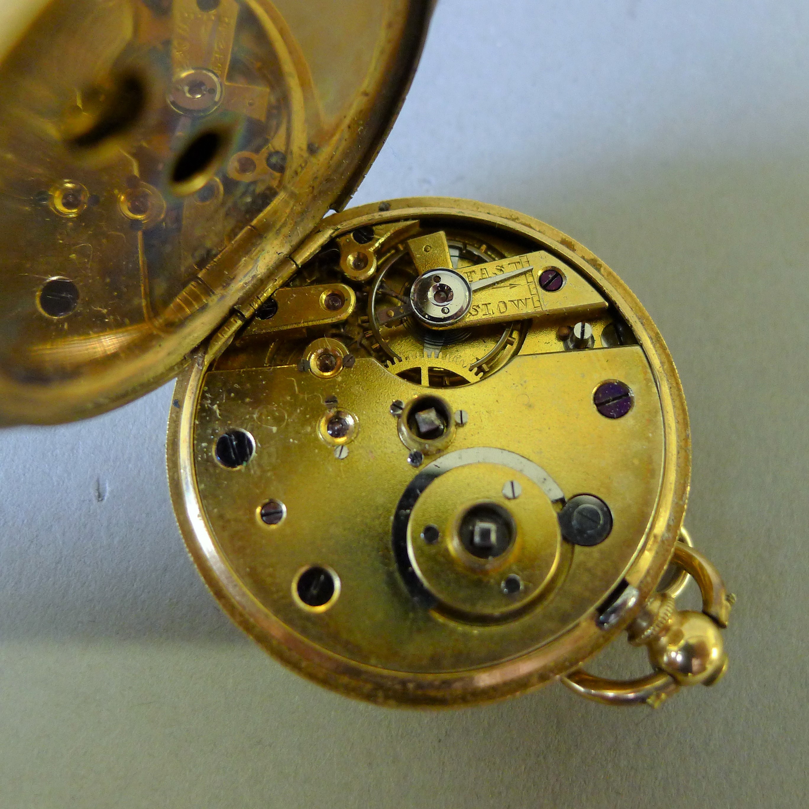 An 18 K gold cased open face pocket watch. 3.5 cm diameter. 42.5 grammes total weight. - Image 7 of 7
