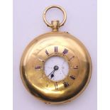 An 18 K gold half hunter pocket watch,