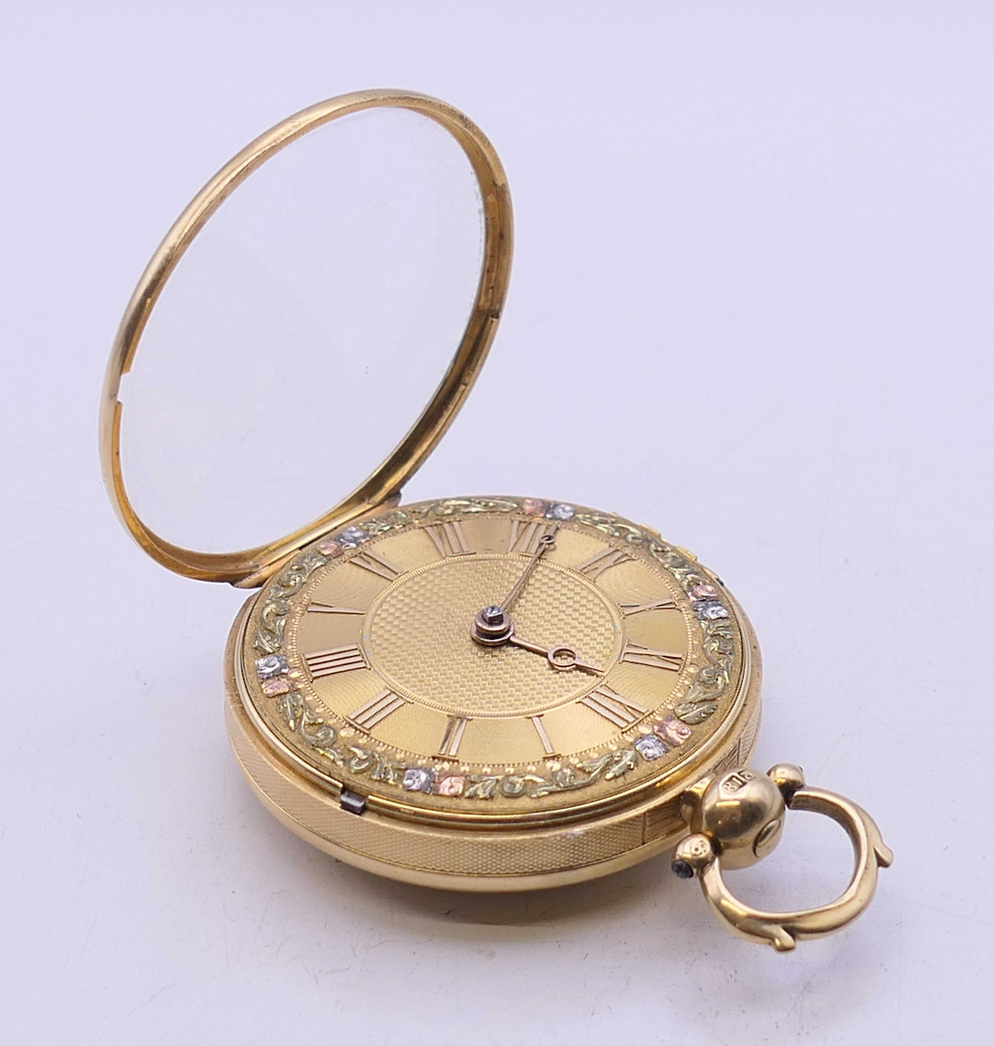 An 18 ct gold cased verge fusee gentleman's open faced pocket watch. 4 cm diameter. 79. - Image 6 of 9
