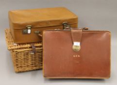 A vintage picnic set, a suitcase and a briefcase. The latter 42 cm wide.