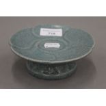 A Chinese Ge-ware ritual offering dish. 14 cm diameter.