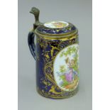 A Vienna porcelain lidded tankard. 17 cm high.