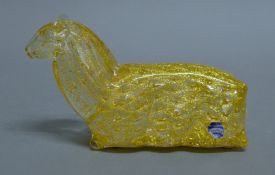 A Murano glass recumbent ram. 19 cm long.