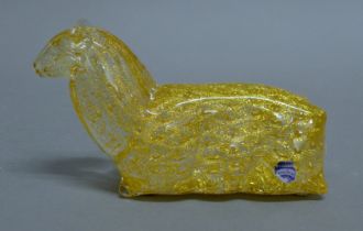 A Murano glass recumbent ram. 19 cm long.