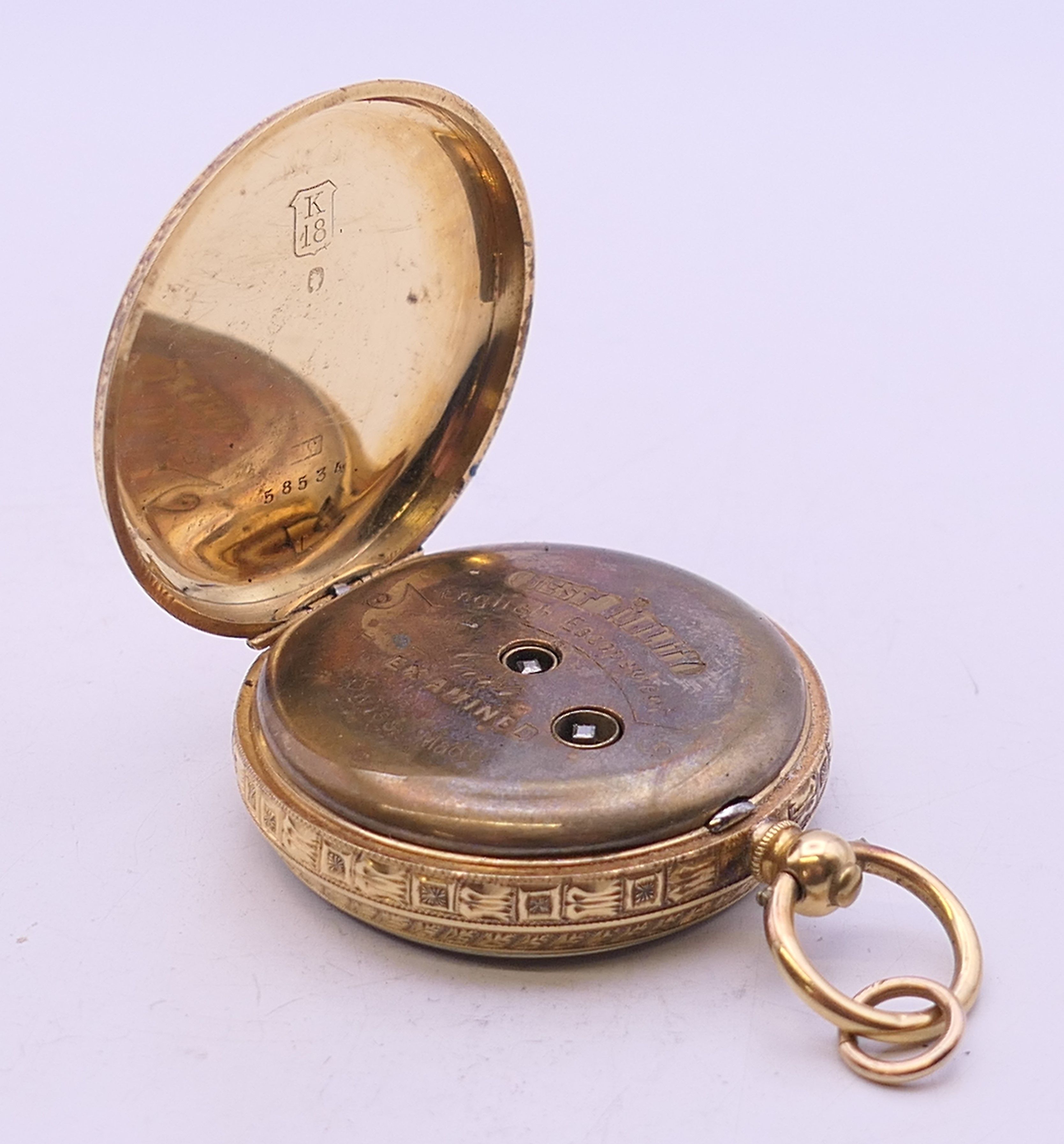 An 18 K gold cased open face pocket watch. 3.5 cm diameter. 42.5 grammes total weight. - Image 4 of 7