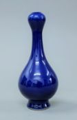 A Chinese blue garlic neck vase. 17 cm high.