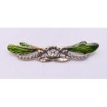 A silver double dragonfly brooch. 7 cm wide.