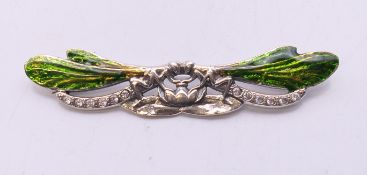 A silver double dragonfly brooch. 7 cm wide.