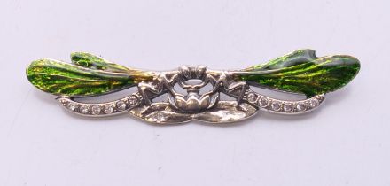 A silver double dragonfly brooch. 7 cm wide.