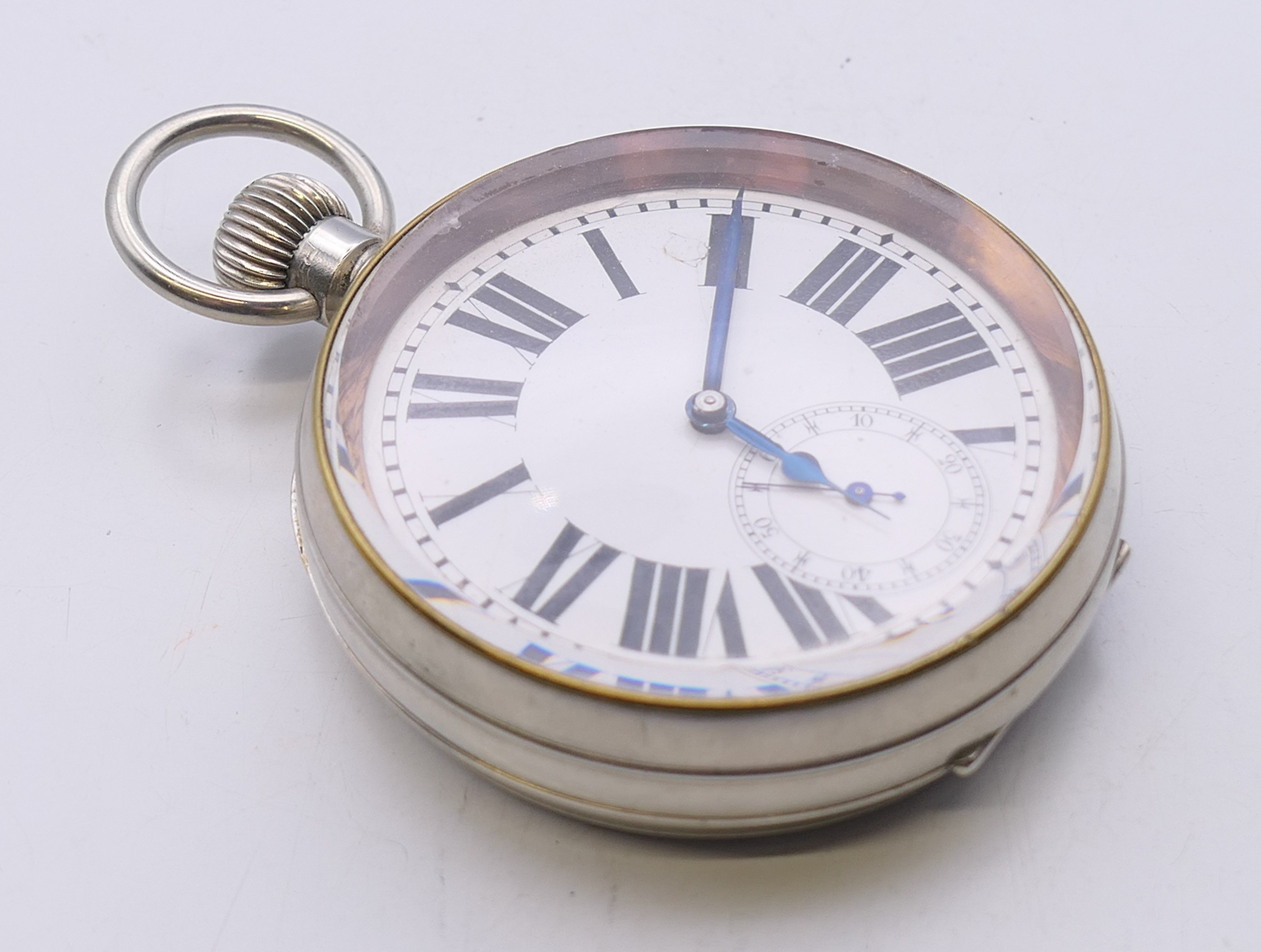 A Swiss silver plated Goliath pocket watch, housed in a silver-clad travelling case. - Image 3 of 9