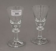 Two 20th century 18th century-style glasses. 14 cm high.