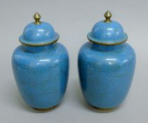 A pair of Chinese blue cloisonne vases. 23 cm high.