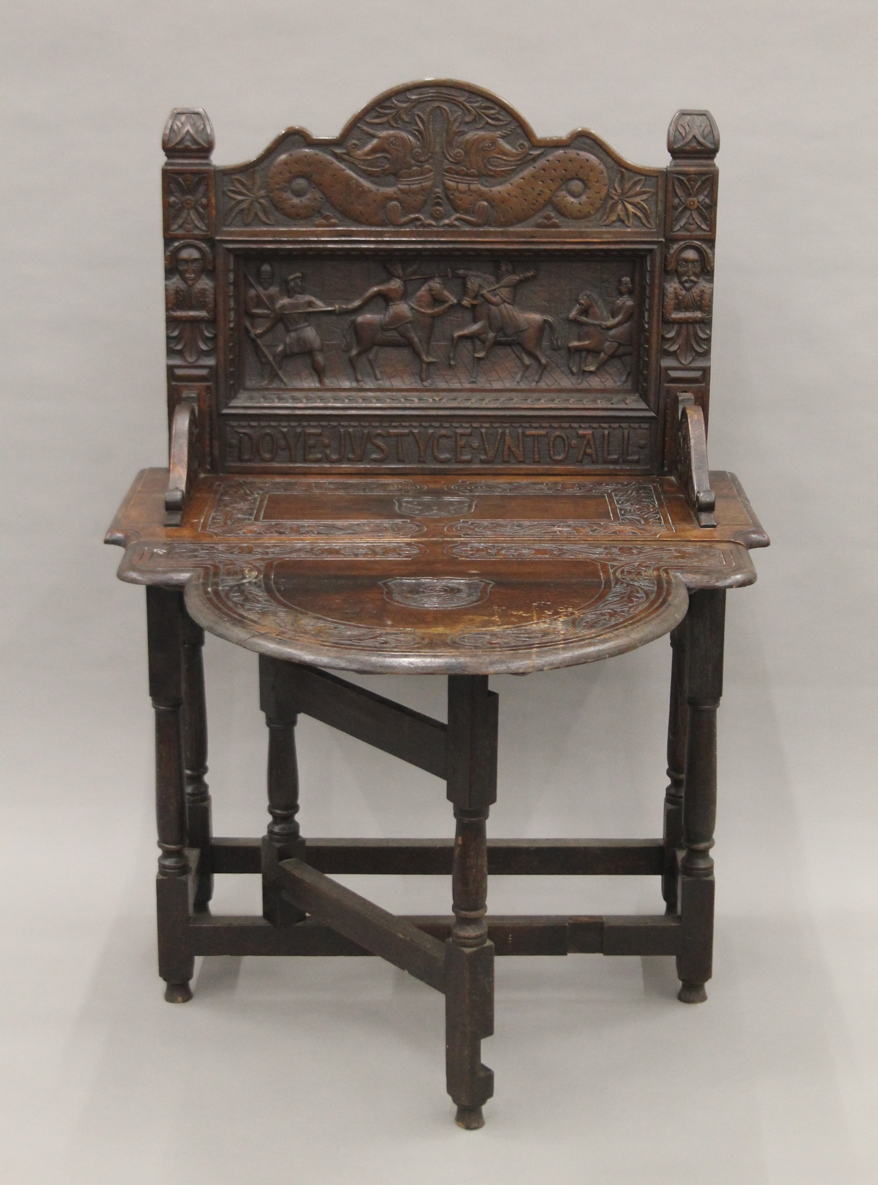 A carved oak single flap side table, the back carved with a scene titled Do Ye Justyce Unto All. - Image 3 of 8