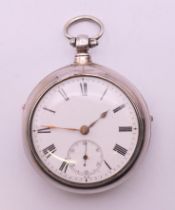 A gentleman's silver pair cased pocket watch, hallmarked for London 1875. 5.25 cm diameter.