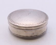 A Dutch silver pill box. 4 cm diameter. 18.7 grammes.