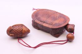 An inro formed as a turtle. 10 cm long.