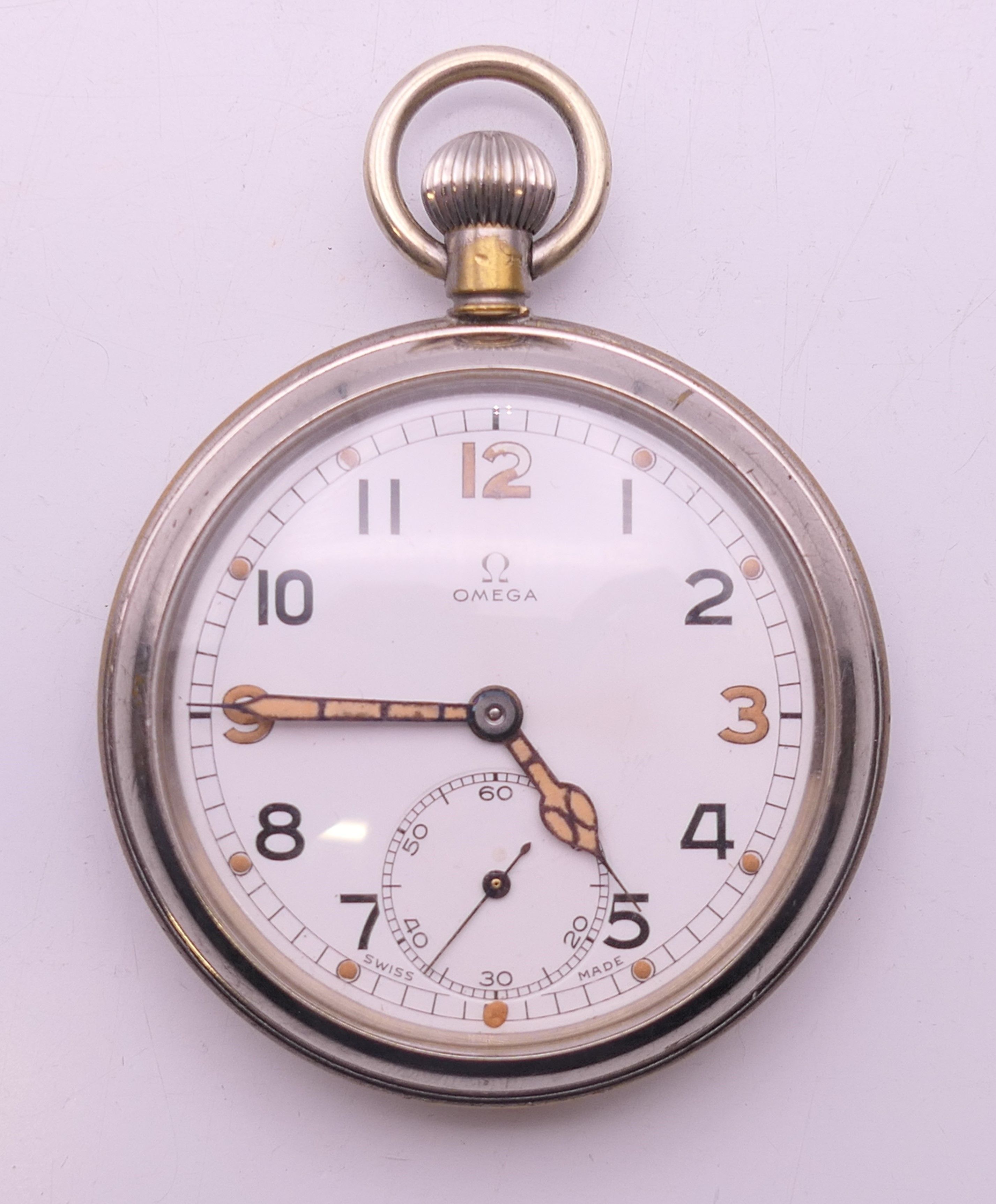 An Omega gentleman's silver-plated pocket watch. 5 cm diameter.