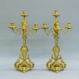 A pair of 19th century gilt brass candelabra. 57.5 cm high.