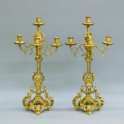 A pair of 19th century gilt brass candelabra. 57.5 cm high.