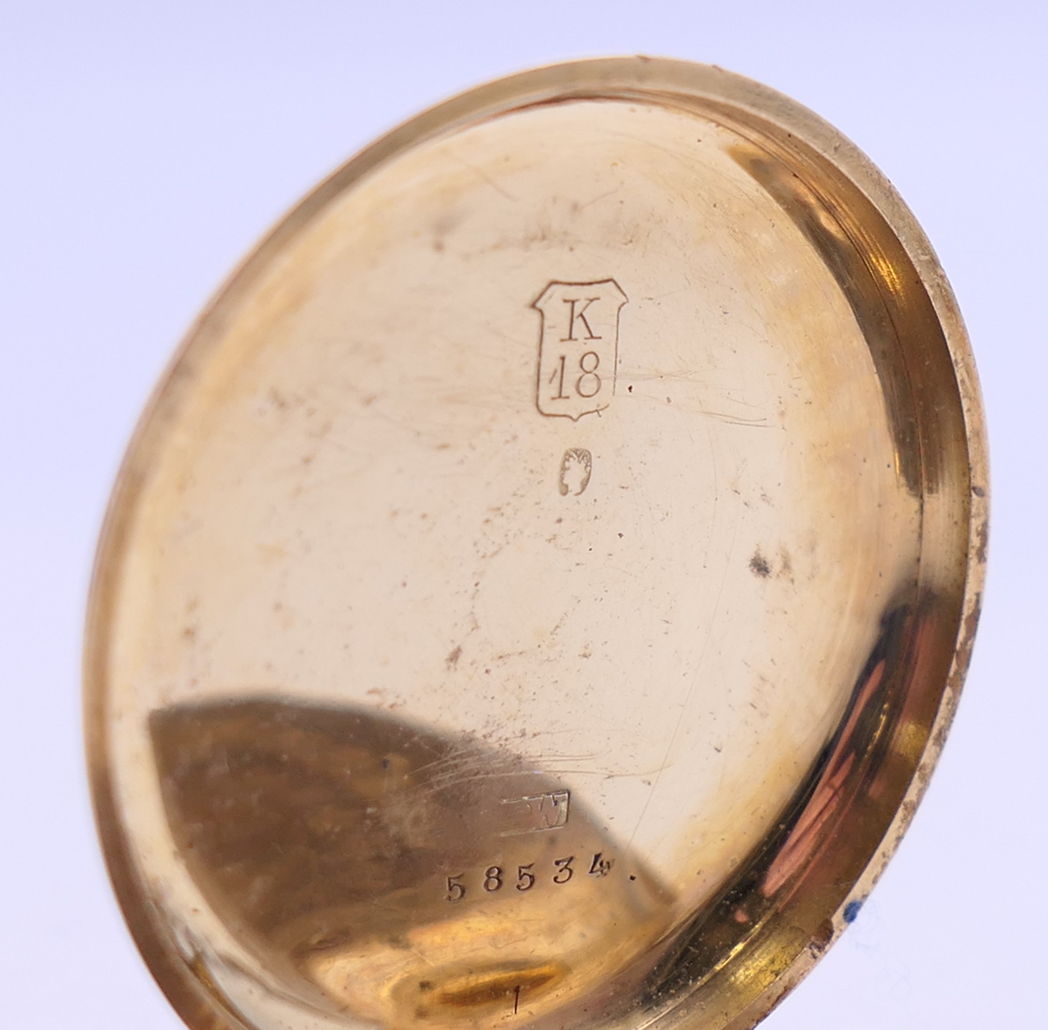 An 18 K gold cased open face pocket watch. 3.5 cm diameter. 42.5 grammes total weight. - Image 5 of 7