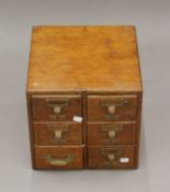 An early 20th century oak six-drawer index box. 32 cm wide.