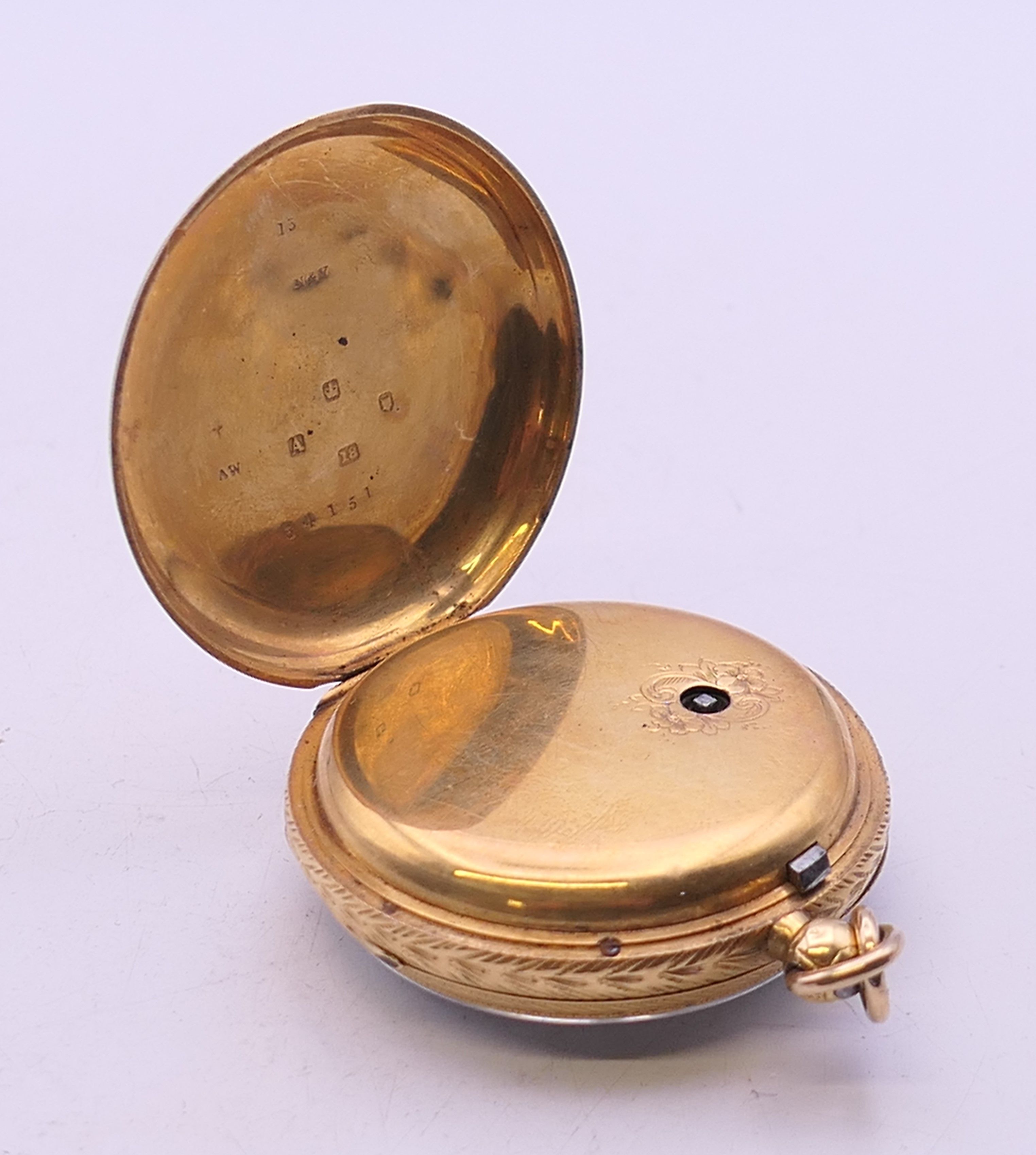 An 18 K gold open-faced pocket watch. 4 cm diameter. 61.8 grammes total weight. - Image 5 of 10