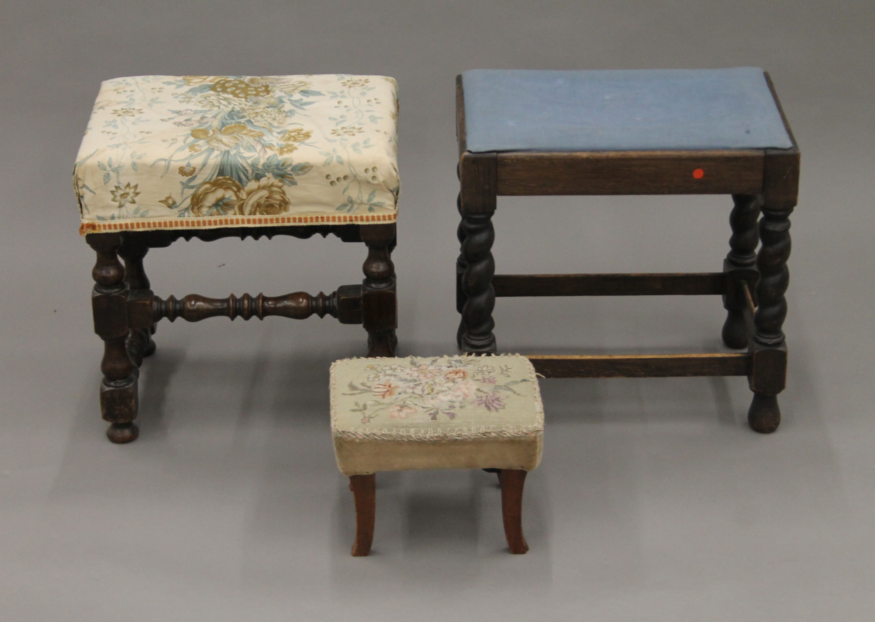 A small mahogany stool and two oak stools. The former 25 cm long.