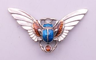 A silver beetle brooch. 5 cm wide.