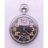 A military pocket watch numbered 15767 and 0552/520-8049. 5 cm diameter.