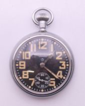 A military pocket watch numbered 15767 and 0552/520-8049. 5 cm diameter.