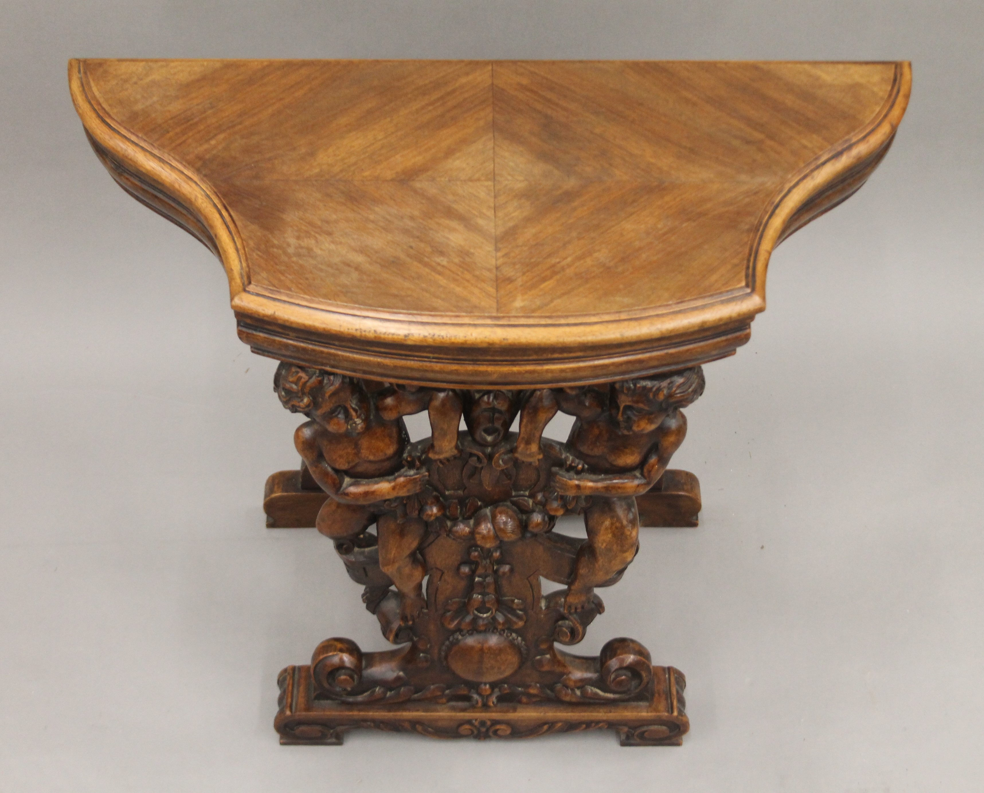 A 19th century carved walnut stool. 65.5 cm wide. - Image 5 of 5