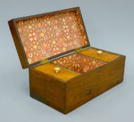 A 19th century mahogany tea caddy. 28.5 cms wide.