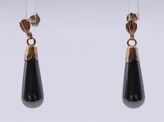 A pair of 9 ct gold and hematite earrings. 2.25 cm high.