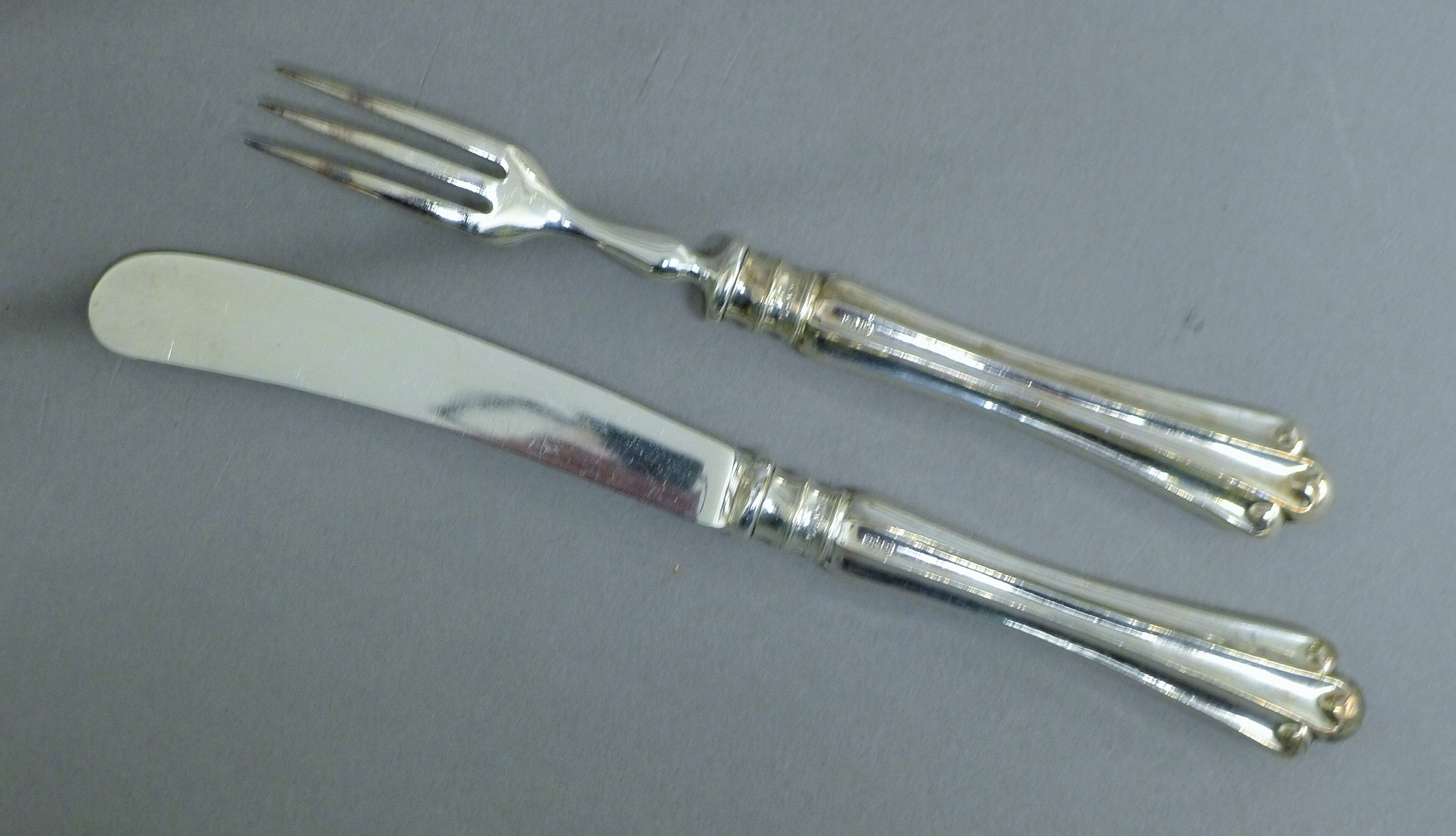 A cased set of silver-handled dessert knives and forks. The box 30 cm wide. - Image 4 of 6