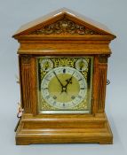 A Victorian oak cased bracket clock. 41.5 cm high.