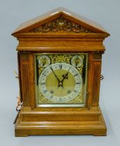 A Victorian oak cased bracket clock. 41.5 cm high.