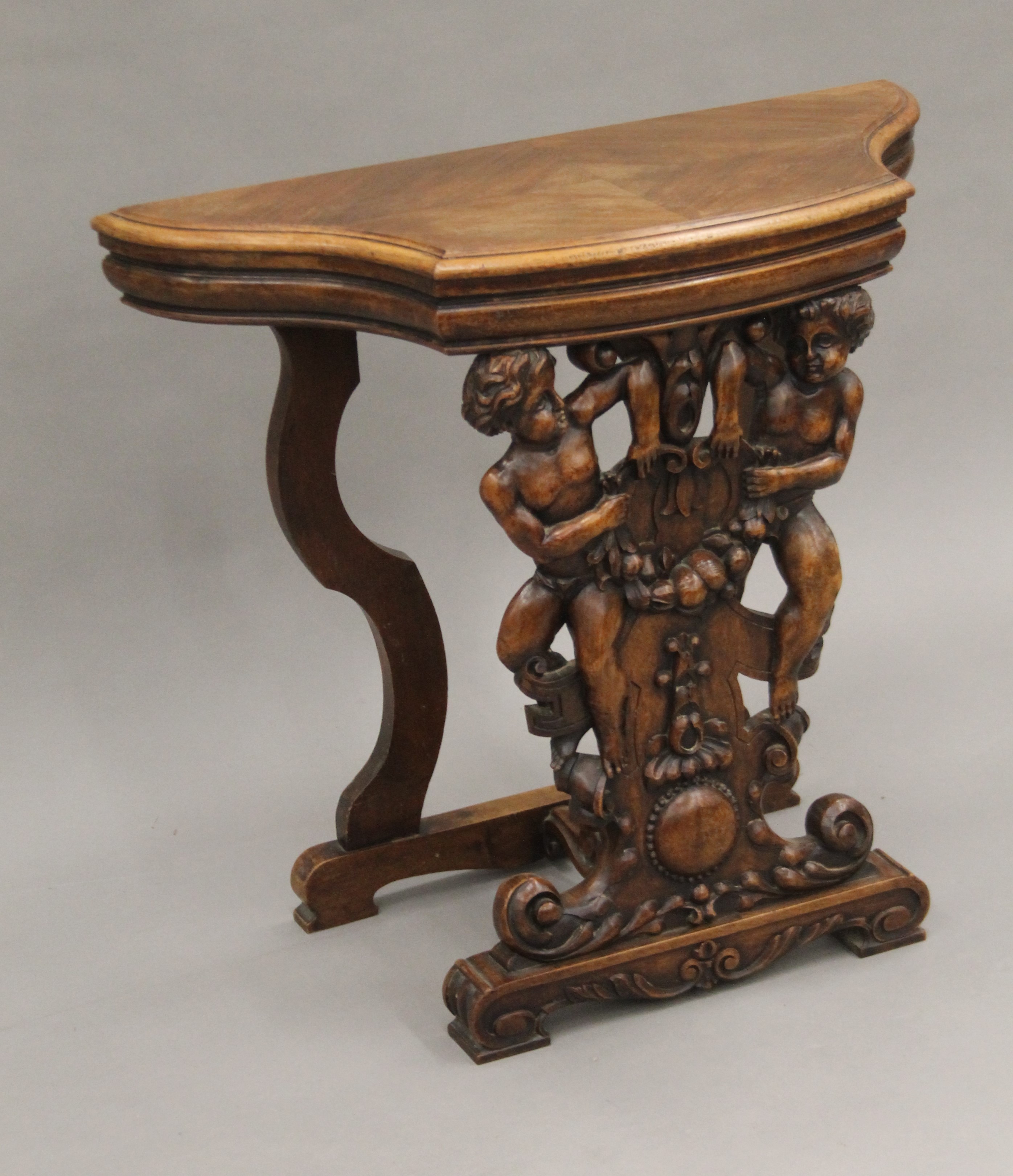 A 19th century carved walnut stool. 65.5 cm wide. - Image 3 of 5