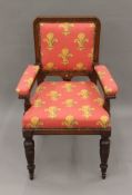 An upholstered Victorian desk chair. 59 cm wide.