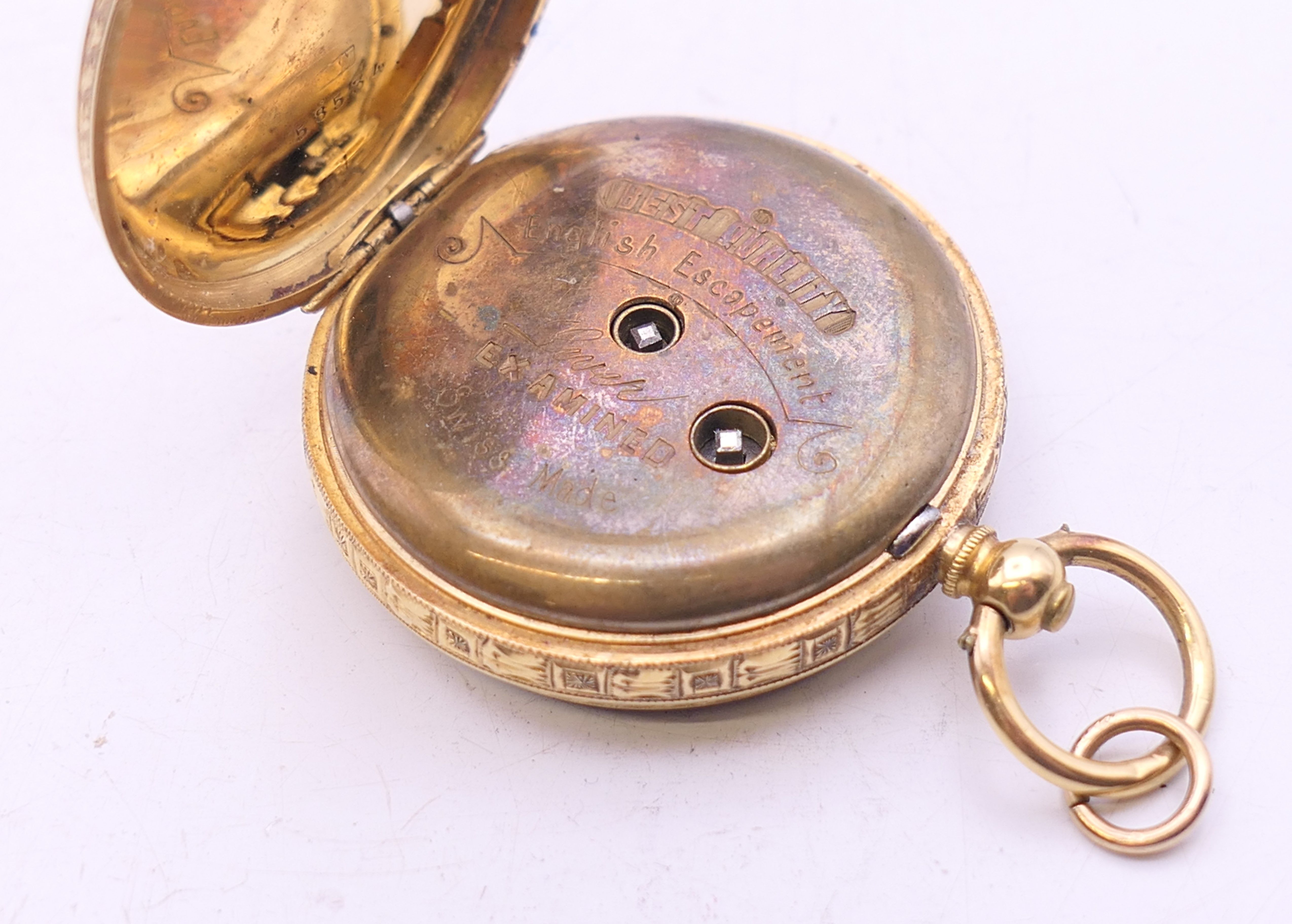 An 18 K gold cased open face pocket watch. 3.5 cm diameter. 42.5 grammes total weight. - Image 6 of 7