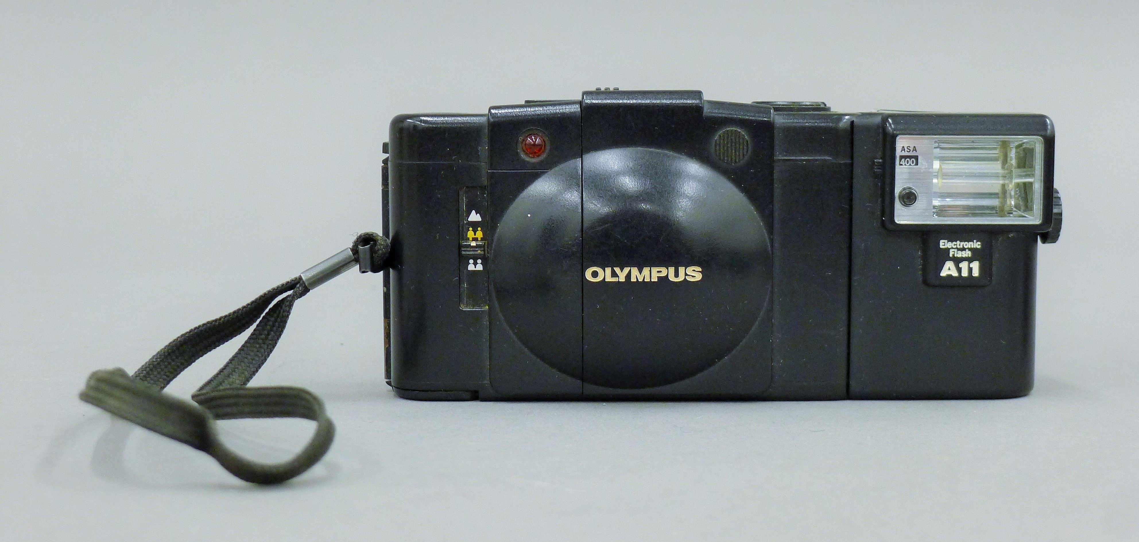 Three working Olympus XA1, XA2, XA3 cameras. - Image 5 of 6