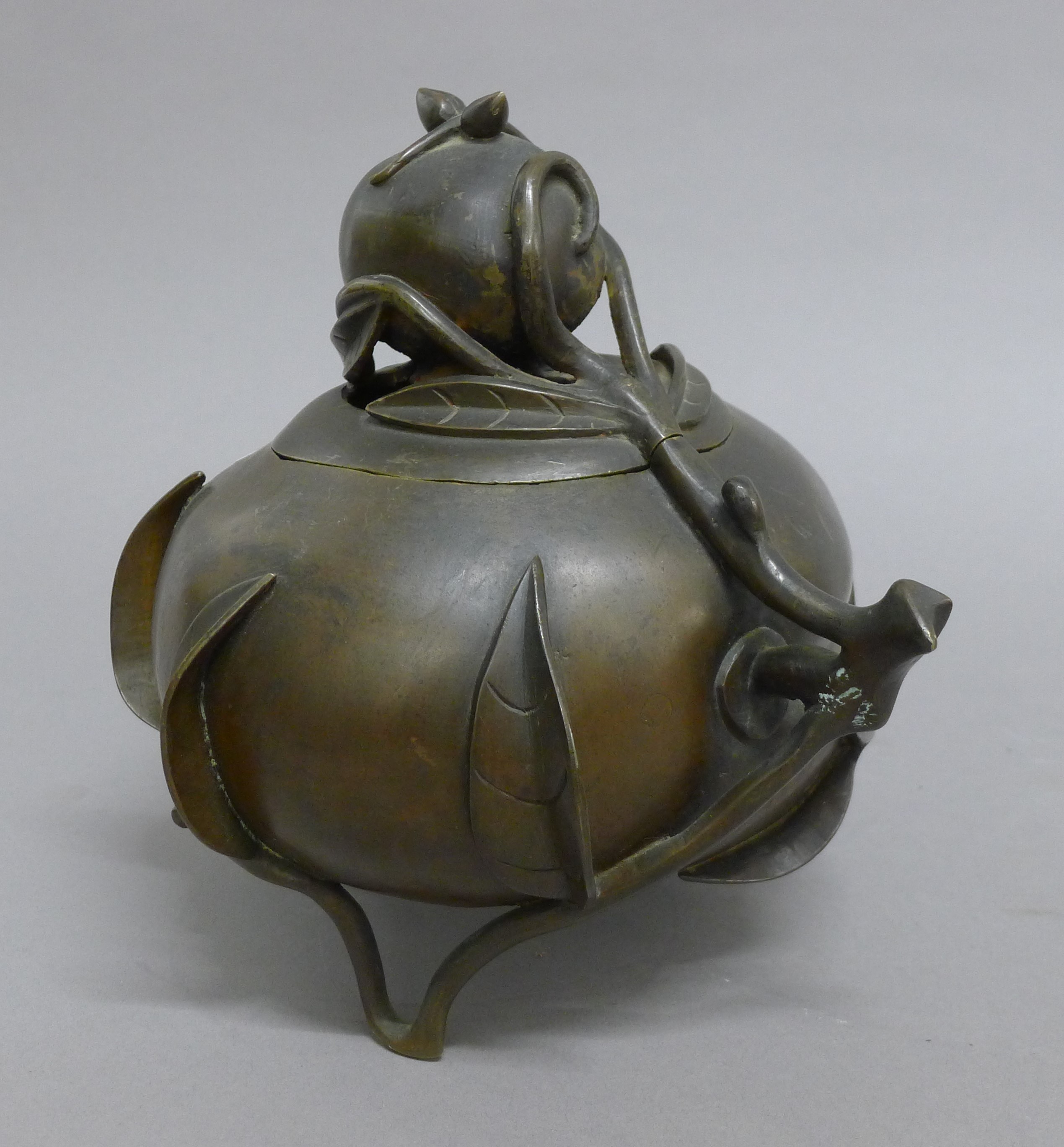 A 19th century Chinese bronze censer formed as a peach. 20 cm high. - Image 3 of 6