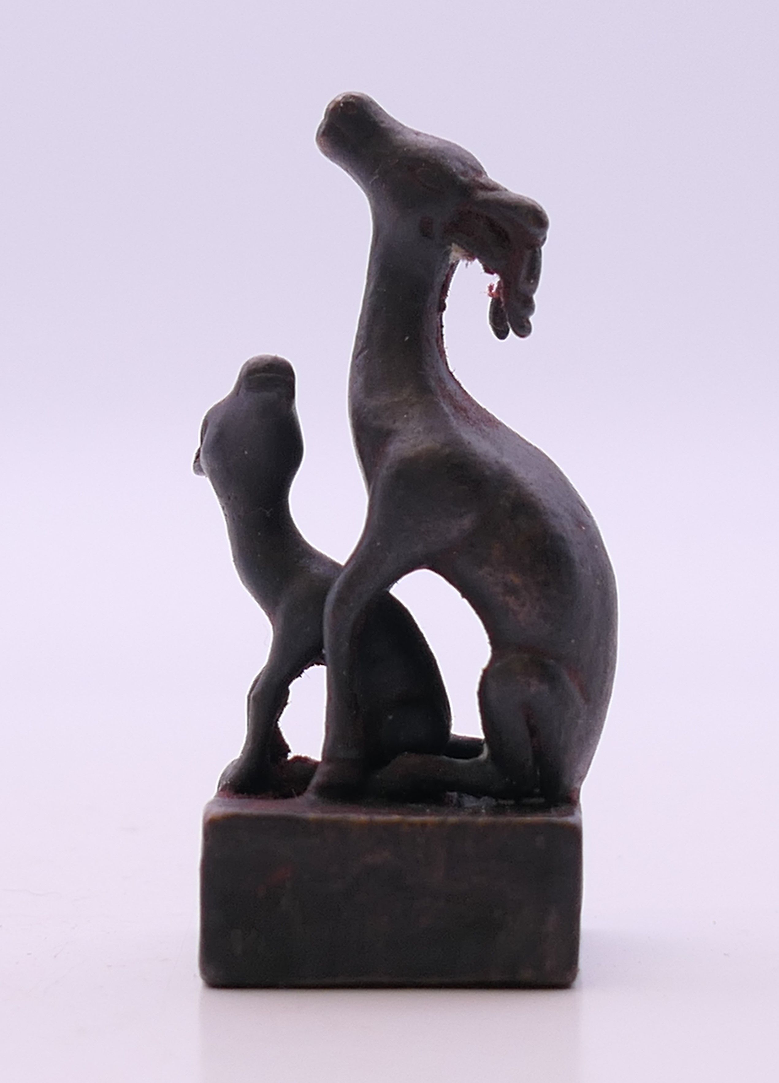 A small bronze double deer seal. 5 cm high. - Image 3 of 5